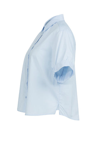 Bloes met Opgerolde Mouwen